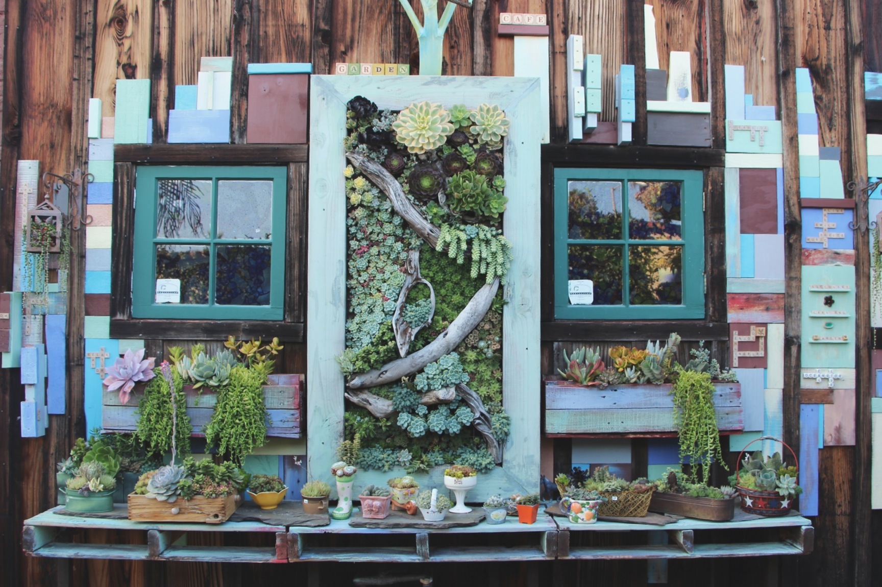 This vertical frame succulent wall was voted best plant art by San Diego Magazine, August 2013 issue.&nbsp;